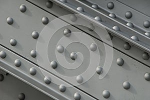 Girder with rivets