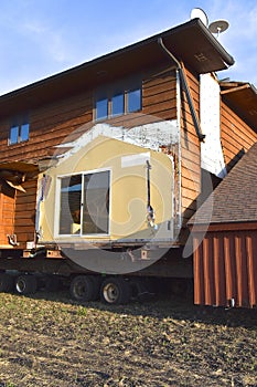 Girders supporting a house being moved