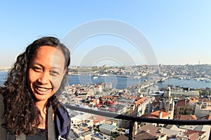 Girl above Galata Bridge in Istanbul