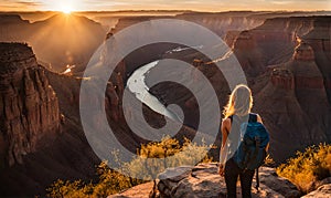 Girl in adventure attire stands at cliff edge, overlooking vast canyon