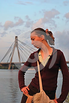 The girl against the Moscow bridge photo