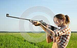 Girl with air rifle