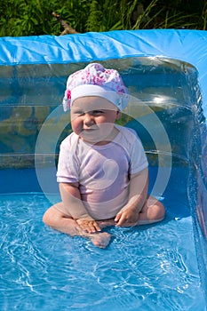 Girl in the air swimming pool