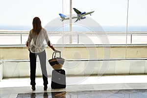 Girl at the airport window