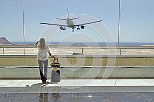 Girl at the airport window