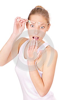 Girl with amazement has lifted glasses