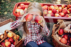 Girl with Apple in the Apple Orchard