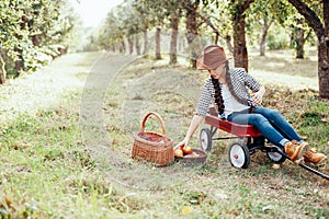 Girl with Apple in the Apple Orchard