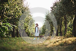 Girl with Apple in the Apple Orchard