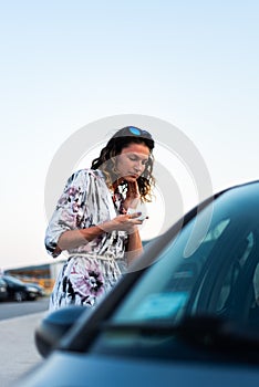 Girl applying face powder outdoor