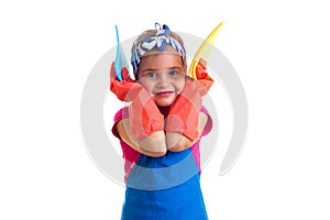 Girl in apron and gloves holding dusters