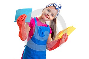 Girl in apron and gloves holding dusters