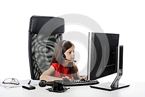 Girl with astonishment looks in the computer