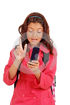 Girl with attitude texting on cell phone