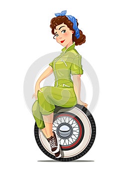 Girl automechanic with vintage car wheel.
