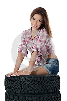 The girl with automobile tyres