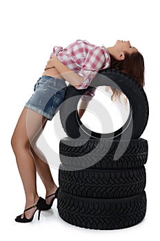 The girl with automobile tyres