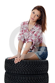 The girl with automobile tyres