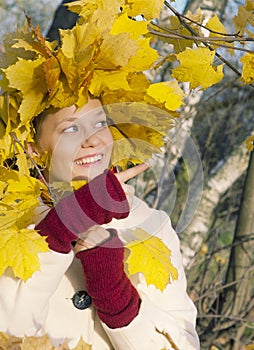 Girl with autumn leaves