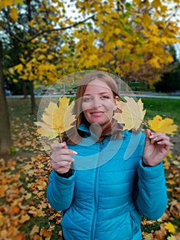 Girl at autumn park - orange colors