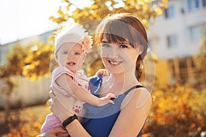 Girl with baby on nature