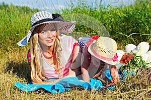 Girl with a baby in nature