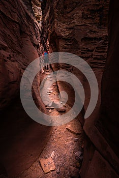 Girl Backpacker exploring Little Wild Horse Canyon Utah