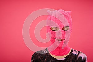 Girl in balaclava with closed mouth