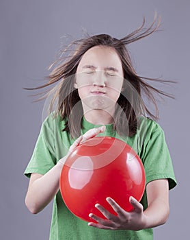 Girl and balloon blast.