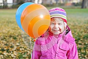 Girl with balloons