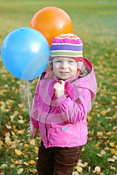 Girl with balloons