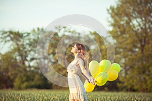 Girl with baloons