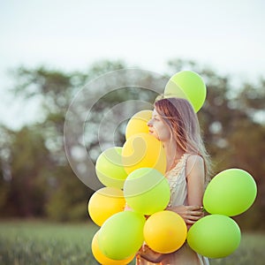 Girl with baloons