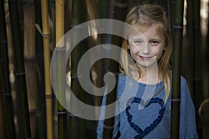 Girl in bamboo thicket photo