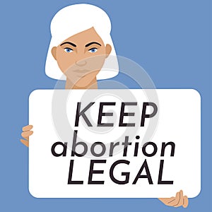 Girl with banner. Keep abortion legal. Lady holding a blank poster with place for text. Womens rights protest concept. Legal