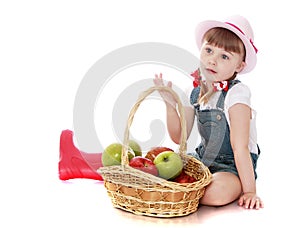 Girl with a basket of apples