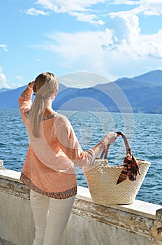 Girl with a basket bag photo