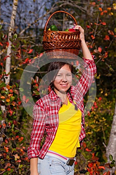 Girl with basket of vegetables