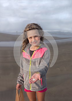 Girl on Beach Finding Seashells Copy Space Room