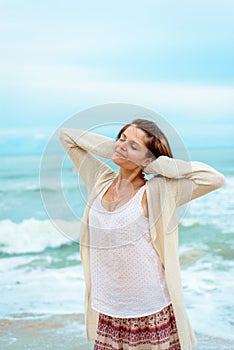 Girl on the beach, freedom concept photo