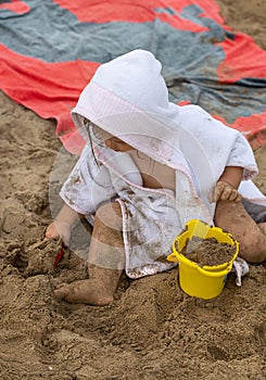 Girl. Beach. Toys. Summer. Towel. Sand. Cute