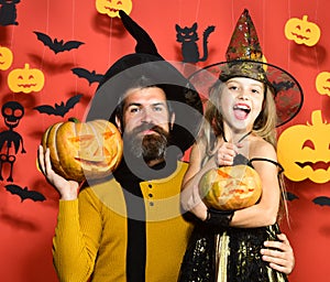 Girl and bearded man with happy faces on red background