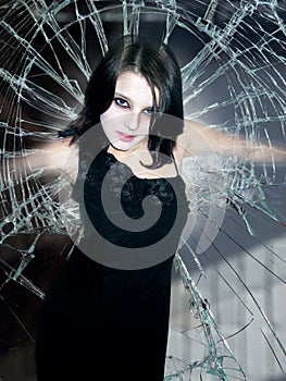 Girl in beaten glass