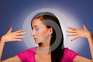 Girl with beautiful nails over blue background