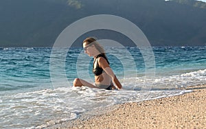 Girl in a beautiful swimsuit on a Turkish beach