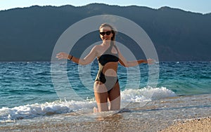 Girl in a beautiful swimsuit on a Turkish beach