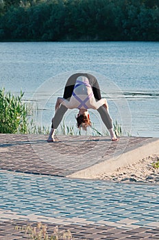 Girl beauty yoga sunrise lake outdoors