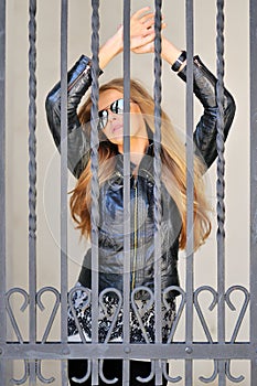 girl behind bars