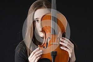 Girl behind violin