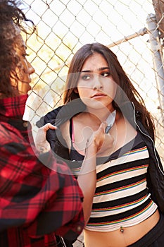 Girl Being Threatened With Knife By Female Gang Member photo